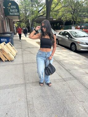 Saint Laurent Black Pebbled Leather Drawstring Shoulder Bag with Gold Logo